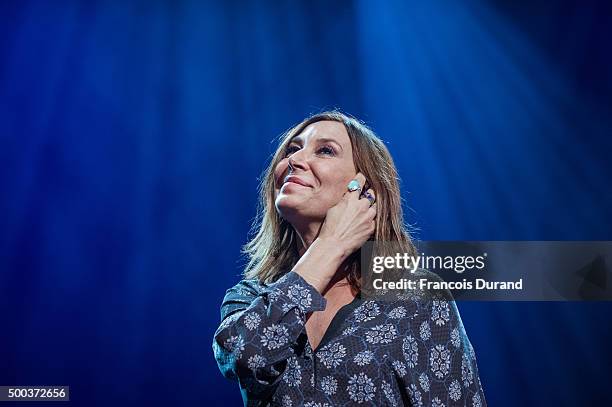 Zazie performs at the "Act For Climate" event at L'Olympia on December 7, 2015 in Paris, France.