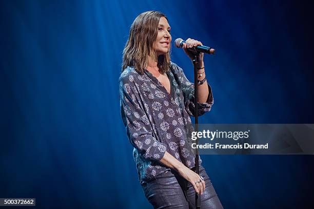 Zazie performs at the "Act For Climate" event at L'Olympia on December 7, 2015 in Paris, France.