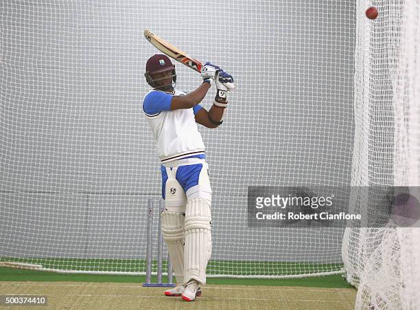 Marlon Samuels of the West Indies bats during a West Indies training session at Blundstone Arena on December 8, 2015 in Hobart, Australia.