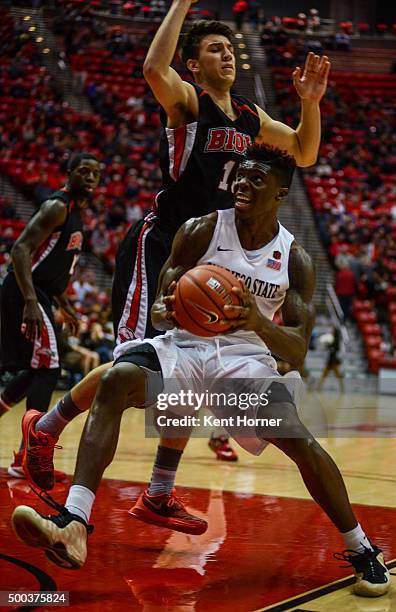 Zylan Cheatham of the San Diego State Aztecs drives to the basket with the ball in the first half against the Biola Eagles at Viejas Arena on...
