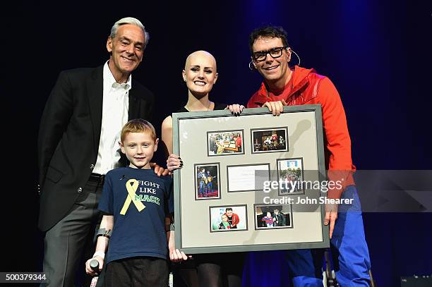 Rick Shadyac, President and CEO of ALSAC/St. Jude Children's Research Hospital; St. Jude patients Mack Ward and Allie Allen, and Bobby Bones during...