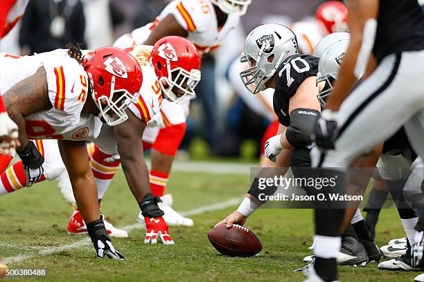 Guard Tony Bergstrom of the Oakland Raiders lines up opposite of defensive end Dontari Poe of the Kansas City Chiefs during the first quarter at O.co...