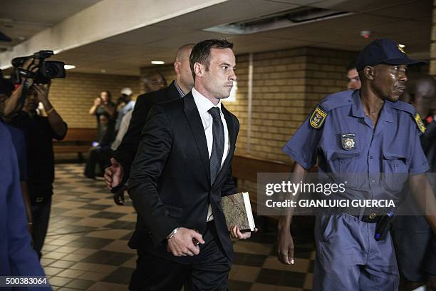 Former Paralympic champion Oscar Pistorius arrives at the South African Gauteng Division High Court in Pretoria, South Africa, on December 8, 2015....