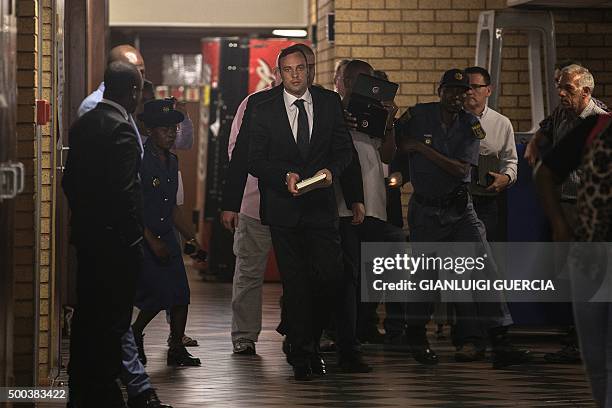 Former Paralympic champion Oscar Pistorius arrives at the South African Gauteng Division High Court in Pretoria, South Africa, on December 8, 2015....