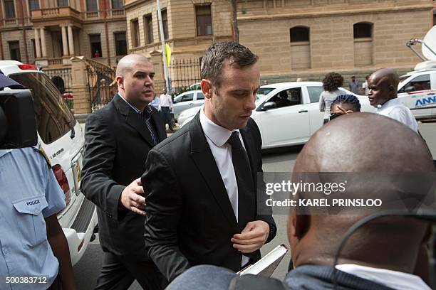 Former Paralympic champion Oscar Pistorius arrives at the South African Gauteng Division High Court in Pretoria, South Africa, on December 8, 2015....