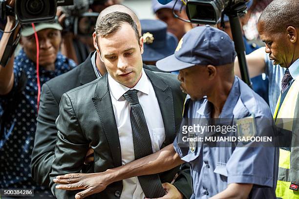 South African paralympian Oscar Pistorius arrives to the Pretoria High court for a bail hearing on December 8, 2015. Pistorius appeared in court for...