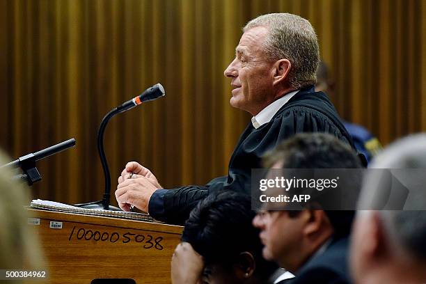 State prosecutor Gerrie Nel speaks during South African paralympian Oscar Pistorius' bail hearing at the Pretoria High Court on December 8, 2015....