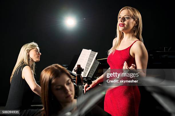 orchestra rehearsal. - opera singer stock pictures, royalty-free photos & images