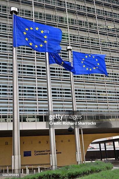 european union flags, berlaymont, brussels - eu flag union jack stock pictures, royalty-free photos & images