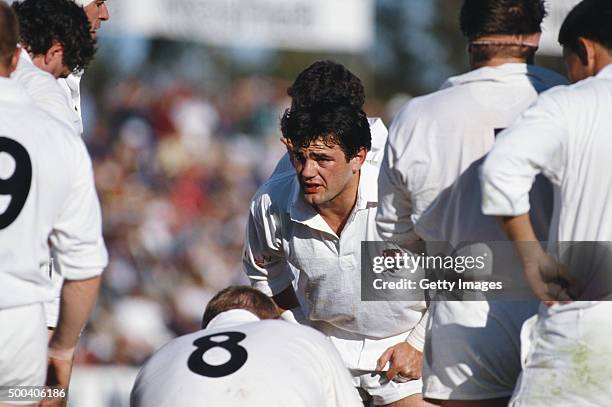 England captain Will Carling speaks with his players during an International match between Fiji and England in July 1991 in Suva, Fiji