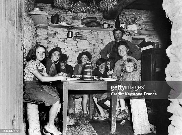 French family, victim of the World War II bombings, temporarily found a shelter in makeshift housing, on June 6 around 8 pm, the city became the...