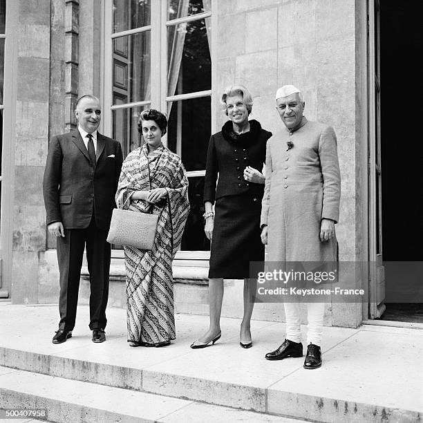 Indian Prime Minister Jawaharlal Nehru and his daughter Indira Gandhi at the Elysee Presidential Palace with French President Georges Pompidou and...