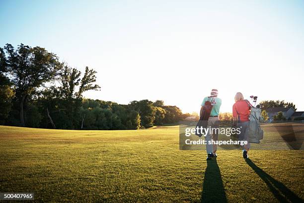 getting down to some golf - golf bag stock pictures, royalty-free photos & images
