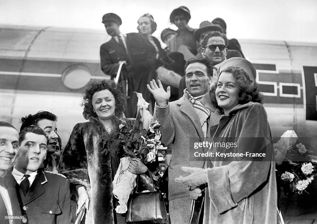 Singer Edith Piaf, Boxer Marcel Cerdan And Mathilda Nail Arriving At Orly Airport