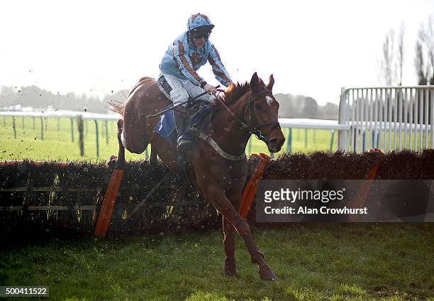 Jamie Moore riding Darebin clear the last to win The Axio Special Works Christmas raceday Juvenile Hurdle Race at Fontwell racecourse on December 08,...