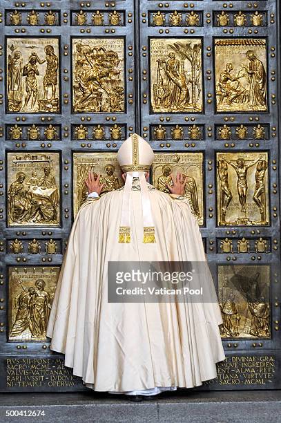 Pope Francis opens the Holy Door of St. Peter's Basilica on December 8, 2015 in Vatican City, Vatican. During the solemnity of the Immaculate...