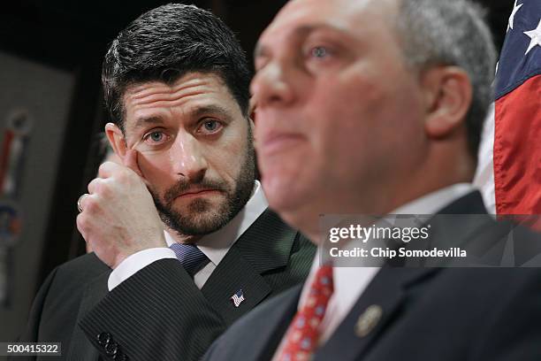 Speaker of the House Paul Ryan listens to Majority Whip Steve Scalise during a news conference with members of the House GOP leadership following the...