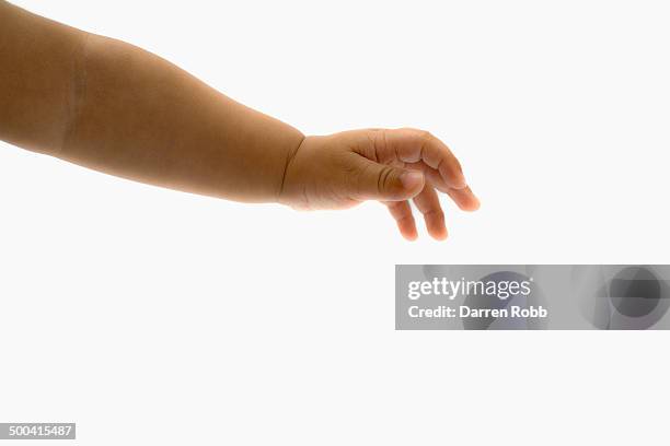 baby girl's with outstretched hand - baby hands stock pictures, royalty-free photos & images