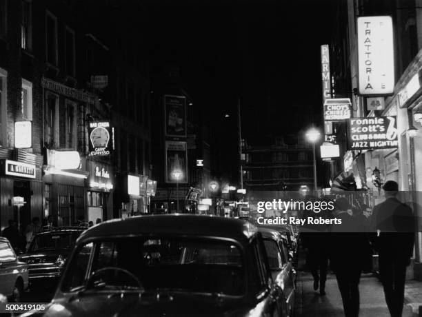 View down Frith Street, looking south towards Shaftesbury Avenue, Soho, London, August 1966.On the right is Ronnie Scott's Jazz Club at 47 Frith...