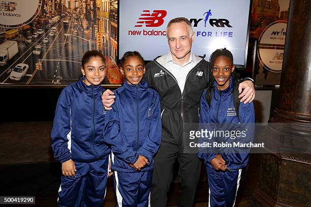S President and CEO Michael Capiraso poses with Mighty Milers during New Balance and New York Road Runners Announce Alliance during Press Conference...