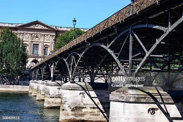 pont des arts and the louvre - pont des arts padlocks stock pictures, royalty-free photos & images