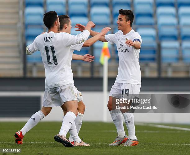 Alvaro Rivero of Real Madrid celebrates after scoring with his teammates during the UEFA Youth League match between Real Madrid and Malmo FF at...