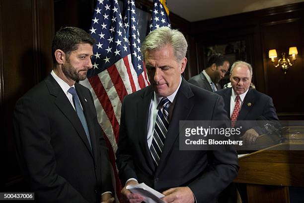 House Speaker Paul Ryan, a Republican from Wisconsin, left, and House Majority Whip Steve Scalise, a Republican from Louisiana, right, look on as...