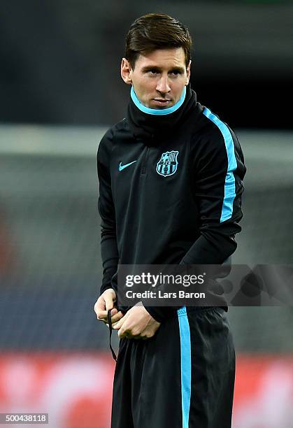 Lionel Messi looks on during a FC Barcelona training session on the eve of the UEFA Champions League groupe E match against Bayer Leverkusen at...