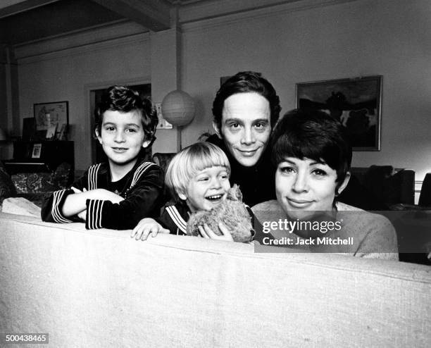 Actor, singer, dancer Joel Grey photographed with his wife Jo Wilder and children Jennifer and James in New York City in 1967.