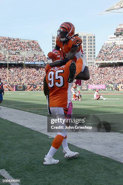 Dre Kirkpatrick celebrates with Wallace Gilberry of the Cincinnati Bengals during their game against the Kansas City Chiefs at Paul Brown Stadium on...