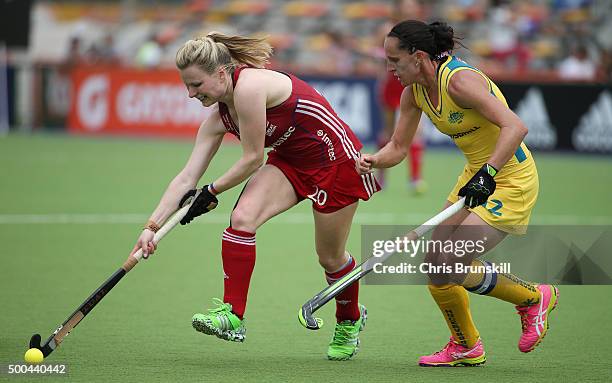 Madonna Blyth of Australia competes with Hollie Webb of Great Britain during the Pool B match between Australia and Great Britain on day four of the...