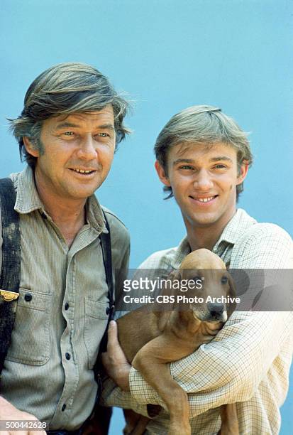 From left to right, Ralph Waite and Richard Thomas , in THE WALTONS. 1974.