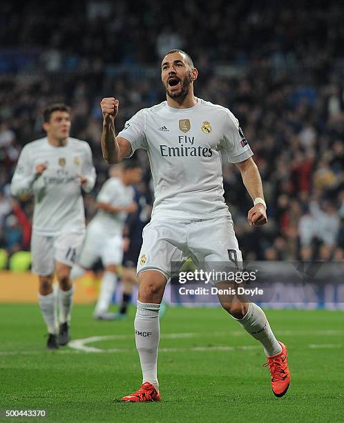 Karim Benzema of Real Madrid celebrates after scoring Real's opening goal during the UEFA Champions League Group A match between Real Madrid CF and...