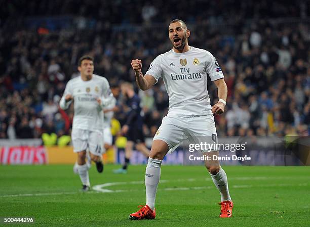 Karim Benzema of Real Madrid celebrates after scoring Real's opening goal during the UEFA Champions League Group A match between Real Madrid CF and...