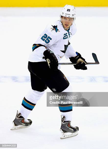 Tye McGinn of the San Jose Sharks plays in the game against the New Jersey Devils at Prudential Center on October 18, 2014 in Newark, New Jersey.