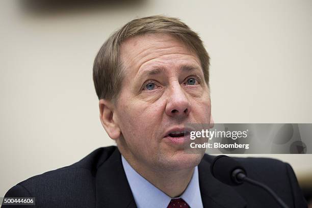 Richard Cordray, director of the Consumer Financial Protection Bureau , testifies during a House Financial Services Committee hearing in Washington,...