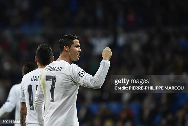 Real Madrid's Portuguese forward Cristiano Ronaldo celebrates after scoring during the UEFA Champions League Group A football match Real Madrid CF vs...