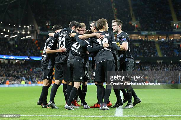 The Team of Borussia Moenchengladbach celebrate after their first goal during the UEFA Champions League group D match between Manchester City FC and...