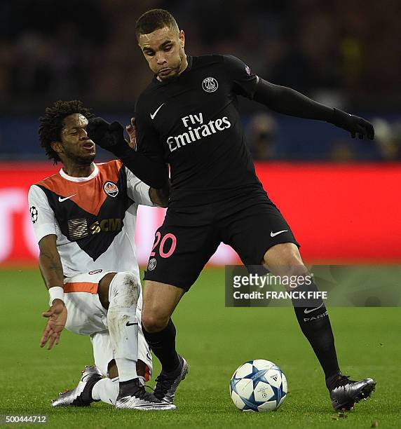 Shakhtar Donetsk's Brazilian midfielder Fred vies with Paris Saint-Germain's French defender Layvin Kurzawa during the UEFA Champions League Group A...