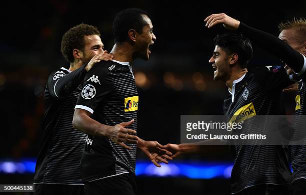 Raffael of Borussia Moenchengladbach celebrates with his team mates after scoring his side's second goal during the UEFA Champions League Group D...