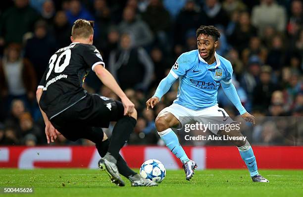 Raheem Sterling of Manchester City takes on Nico Elvedi of Borussia Moenchengladbach during the UEFA Champions League Group D match between...