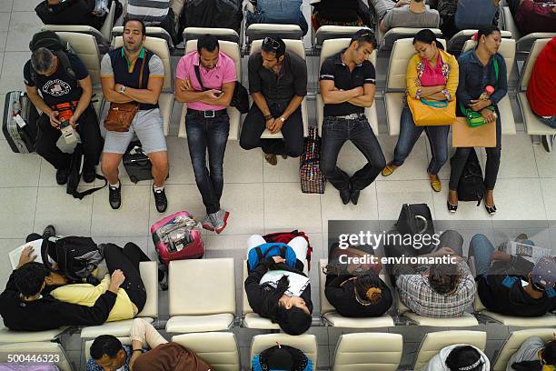 waiting to travel. - bangkok airport stock pictures, royalty-free photos & images