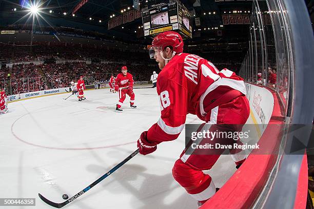 Joakim Andersson of the Detroit Red Wings controls the puck in the corner during an NHL game against the Nashville Predators at Joe Louis Arena on...