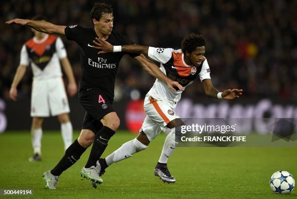 Paris Saint-Germain's French midfielder Benjamin Stambouli vies with Shakhtar Donetsk's Brazilian midfielder Fred during the UEFA Champions League...