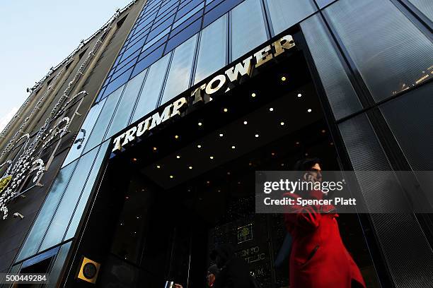 People walk by the Trump Tower in Midtown Manhattan on December 8, 2015 in New York City. Donald Trumps latest incendiary remarks concerning Muslims...