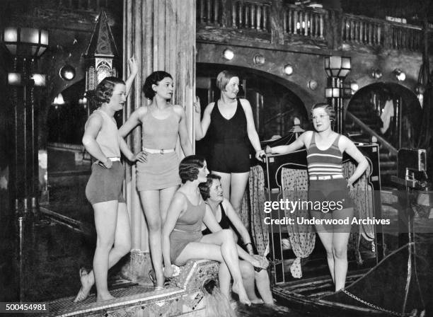 Mlle Claire Hebrard with her friends at the Lido Pool, Paris, France, circa 1932. A model in one of the leading Parisian fashion houses, she was...