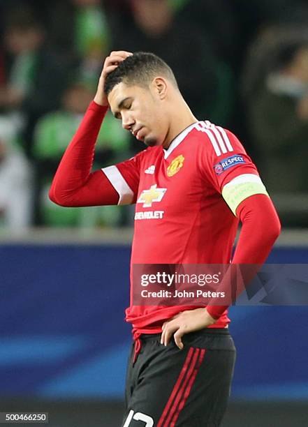 Chris Smalling of Manchester United shows his disappointment during the UEFA Champions League match between VfL Wolfsburg and Manchester United at...