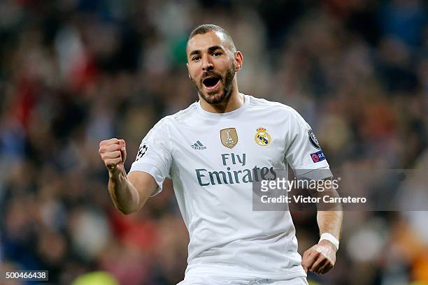 Karim Benzema of Real Madrid celebrates after scoring the opening goal during the UEFA Champions League Group A match between Real Madrid and Malmo...