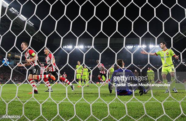 Luuk de Jong of PSV celebrates after he shoots and scores a goal past Goalkeeper, Igor Akinfeev of CSKA during the group B UEFA Champions League...