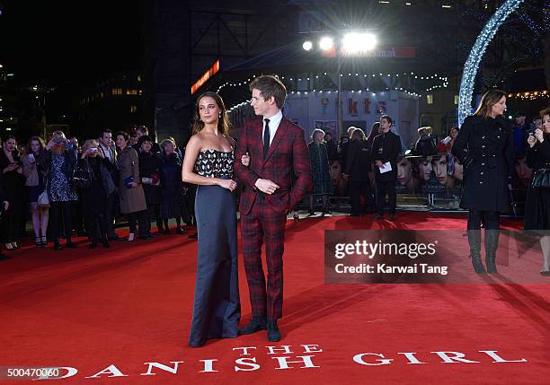 Eddie Redmayne and Alicia Vikander attend the UK Film Premiere of "The Danish Girl" on December 8, 2015 in London, United Kingdom.